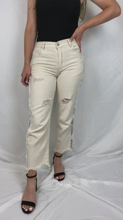 Cropped, straight-fit, cream colored pants with black and white paisley printed panel going down both pant sides.